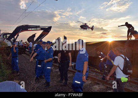 Ankara. 8th July, 2018. Rescuers work at the accident site after a train derailed in Tekirdag, northwestern Turkey, July 8, 2018. At least 10 people were killed and 73 others were injured when a commuter train derailed on Sunday in Turkey's northwestern Tekirdag province, local media reported. Credit: Xinhua/Alamy Live News Stock Photo