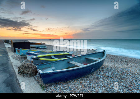 Dawn over boats at Selsey Bill on the West Sussex coast Stock Photo
