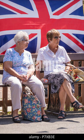 Two middle aged ladies enjoying the summer weather, England, UK Stock Photo