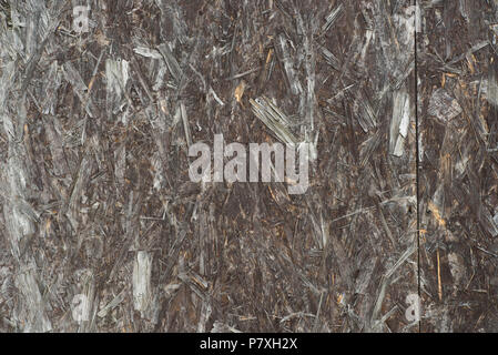 old brown weathered fiberboard background texture Stock Photo