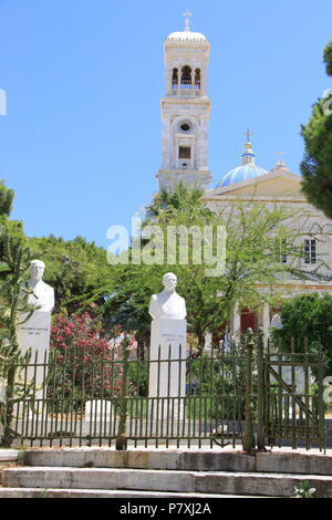 Memorial statues in the grounds of Saint Nicholas church, Emoupolis, Syros Island, South Aegean Sea, GREECE, PETER GRANT Stock Photo