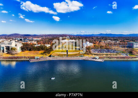 Wide calm Lake Burley Griffin in the middle of Canberra city - Australian Capital Territory, in elevated aerial view towards lake shores and capitol h Stock Photo