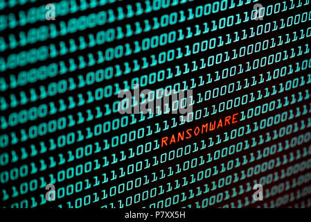 Ransomware or Wannacry text and binary code concept from the desktop computer screen, selective focus, Security Technology concept, Internet Hacker co Stock Photo