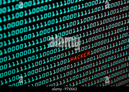 Hacker text and binary code concept from the desktop computer screen, selective focus, Security Technology concept, internet hacker concept Stock Photo