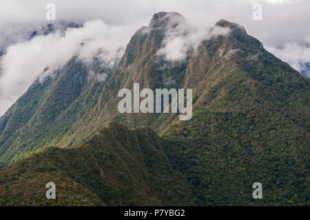 Andes mountains with clouds above the peak. Inca Trail. Peru Stock Photo