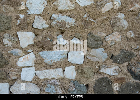 Close-up view of white square stone brick wall. Stock Photo