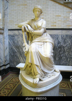 English: Sappho by William Wetmore Story (1819-1895), 1866, in Main Building, Drexel University, Philadelphia, Pennsylvania, USA. This artwork is in the  because the artist died more than 70 years ago. 29 November 2010, 13:59:50 340 Sapho - Drexel University - IMG 7328 Stock Photo