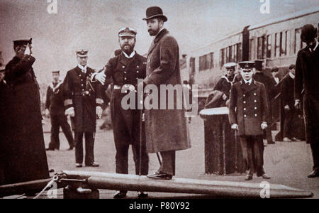 Prince George, Prince of Wales, with his eldest son Edward who took the examination to enter the Royal Naval College, Osborne as a cadet, and began there in 1907. Two years later, Edward moved on to the Royal Naval College at Dartmouth. he was later crowned Edward VIII and was King of the United Kingdom and the Dominions of the British Empire, and Emperor of India, from 20 January 1936 until his abdication on 11 December the same year, after which he became the Duke of Windsor. Stock Photo