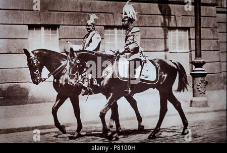 King George V of England and Kaiser Wilhelm II, the last German Emperor ruling the German Empire and the Kingdom of Prussia, riding to the wedding of the Kaiser's daughter  on 24 May 1913 in Berlin. Princess Victoria Louise of Prussia married  Ernest Augustus, the heir to the title of Duke of Cumberland in an extravagant wedding. Wilhelm II  was the eldest grandchild of Queen Victoria of the United Kingdom and related to many monarchs and princes of Europe, most notably, King George V of the United Kingdom and Emperor Nicholas II of Russia. Stock Photo