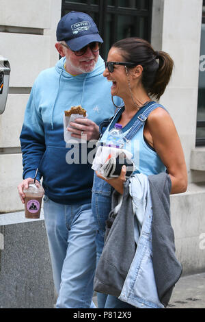 Chris Evans and his pregnant wife Natasha Shishmanian might have given away their expecting twins gender by wearing matching blue clothes.  Chris and Natasha were looking love up and laughing as they left BBC Radio Two Studios.  Chris was eating a healthy breakfast from Joe & The Juice - London  Featuring: Chris Evans, Natasha Shishmanian Where: London, United Kingdom When: 07 Jun 2018 Credit: WENN.com Stock Photo