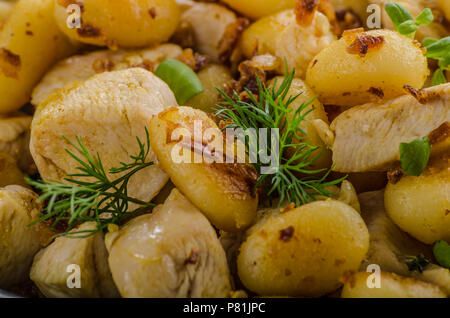Fried gnocchi chicken curry, food photography, delish food with herbs Stock Photo