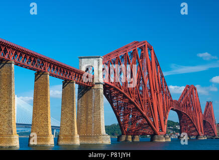 The iconic Forth Bridge spans the Firth of Forth, connecting Queensferry and North Queensferry, summer 2018.