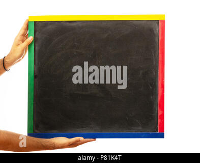 Male hands holding a blank blackboard isolated on white background, clipping path, copy space Stock Photo