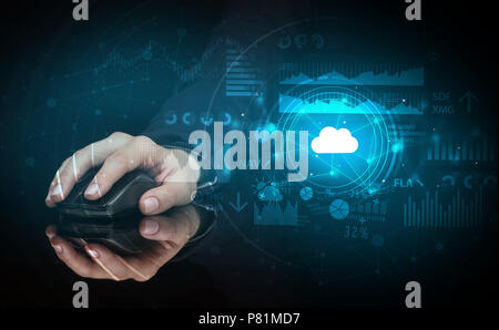 Hand using wireless mouse with cloud technology concept and dark background Stock Photo