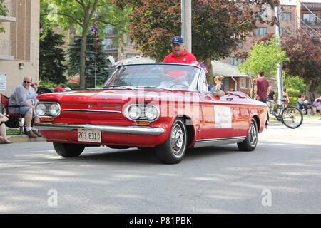 Red Corvair convertible parading in the Fourth of July Parade in Des Plaines, Illinois. Stock Photo