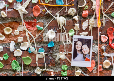 Detail of the famous Market Theater Gum Wall, local Seattle landmark located in Post Alley under Pike Place Market, WA, USA. Stock Photo