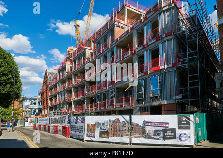 New apartments under construction in Wentworth Street, Spitalfields, East London, near Brick Lane Stock Photo