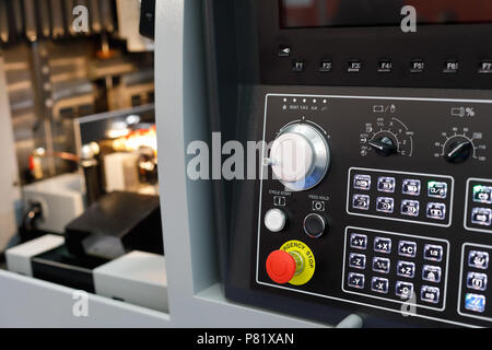 Control panel of modern CNC machine. Selective focus. Stock Photo