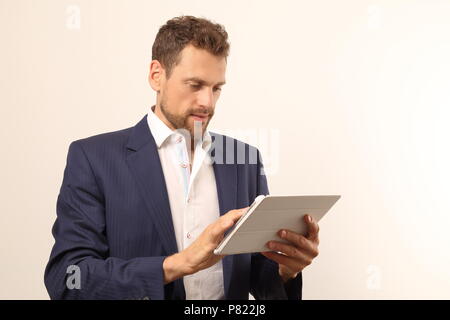 A Modern business man with tablet PC Stock Photo