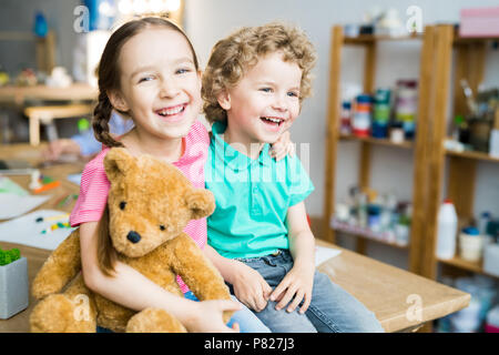 Happy Kids with Teddy Bear Stock Photo