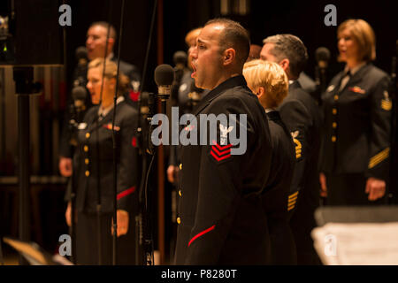 EDINBORO, PA (April 5, 2016) Musician 1st Class Dennys Moura sings with the United States Navy Band Sea Chanters chorus during a concert at Edinboro University. The Sea Chanters are on a 22-day tour of the northeastern United States. Stock Photo