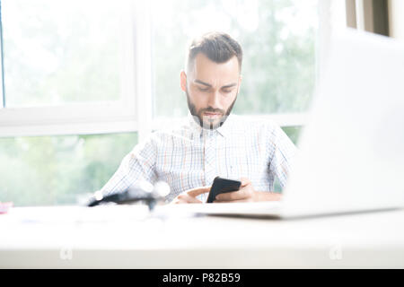 Handsome Man Using VR in Office Stock Photo