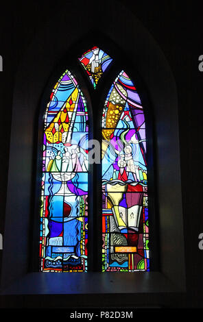 Stained glass by George Walsh in the refurbished windows at St Kentigerns Catholic Church in Eyeries Stock Photo