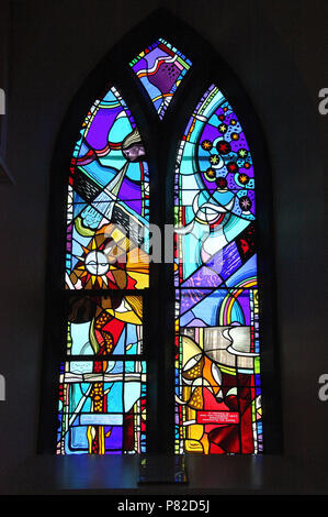 Stained glass by George Walsh in the refurbished windows at St Kentigerns Catholic Church in Eyeries Stock Photo