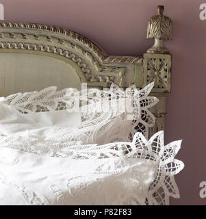 Close-up of a pair of crisp cotton pillows edged with broderie anglaise Stock Photo