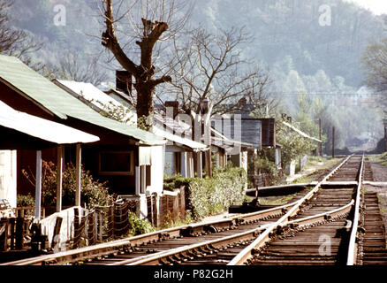 View of Miners' Homes in a Coal Company Town near Logan West Virginia. Next to the Railroad Tracks April 1974 Stock Photo