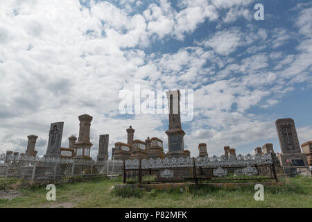 Armenia. The Noratus cemetery with many khachkars. Here visible the adjacent modern cemetery Stock Photo