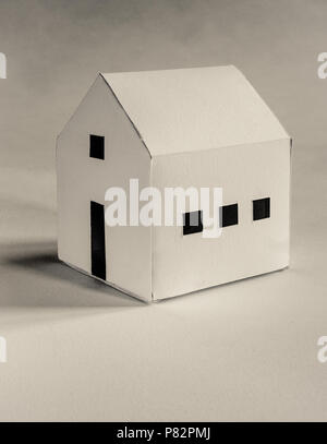 white cardboard hand made paper work house Stock Photo