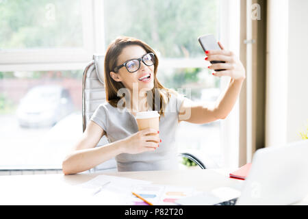 Young Businesswoman Taking Selfie Stock Photo