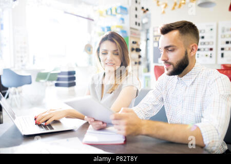 Two Sales Managers in Shop Stock Photo