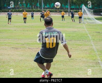 SATTAHIP, Thailand (June 22, 2016) A Royal Thai Navy sailor sends in a corner kick during a soccer match against U.S. Navy sailors from USS Stethem (DDG 63) and Patrol Squadron (VP) 40 during Cooperation Afloat Readiness and Training (CARAT) Thailand 2016. CARAT is a series of annual maritime exercises between the U.S. Navy, U.S. Marine Corps and the armed forces of nine partner nations to include Bangladesh, Brunei, Cambodia, Indonesia, Malaysia, the Philippines, Singapore, Thailand, and Timor-Leste. Stock Photo