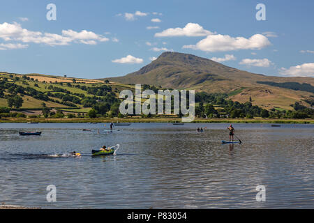 People taking part in various watersports on Lake Bala, or Llyn Tegid in Gwynedd, mid Wales, UK. Stock Photo