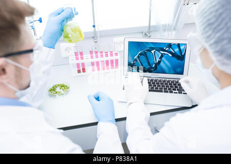 Two Scientists doing Research Stock Photo