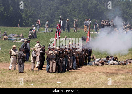 Gettysburg, Pennsylvania, USA. 8th July, 2018. Confederate troop reenactors in action during the battle at the Civil War reenactment 155th anniversary of 'Pickett's Charge' in Gettysburg PA Credit: Ricky Fitchett/ZUMA Wire/Alamy Live News Stock Photo