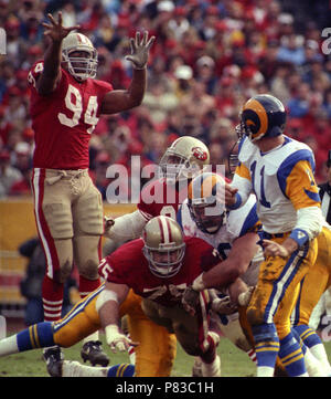 San Francisco, California, USA. 14th Jan, 1990. San Francisco 49ers vs Los  Angles Rams at Candlestick Park Saturday, January 14, 1990. NFC Playoff  49ers beat Rams 30-3. 49er defensive end Pierce Holt (