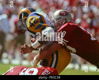 San Francisco, California, USA. 1st Oct, 1989. San Francisco 49ers vs Los  Angles Rams at Candlestick Park Sunday, October 1, 1989. Rams Beat 49ers  13-12. 49er defensive end Pierce Holt (78) tackles