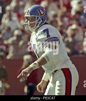 Quarterback John Elway #7 of the Denver Broncos passes the ball down field  against the Los Angeles Raiders.Circa the 1990's. (Icon Sportswire via AP  Images Stock Photo - Alamy