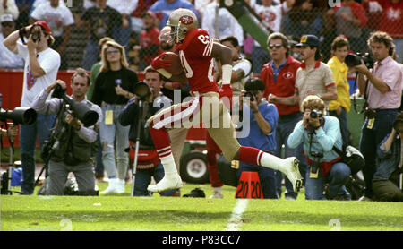 Wide Receiver Jerry Rice #80 of the San Francisco 49ers catches the ball  and moves down field.Circa the 1980's. (Icon Sportswire via AP Images Stock  Photo - Alamy