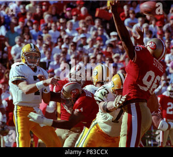 Green Bay Packer cornerback. Al Harris intercepts a Mark Brunell pass late  in the fourth quarter as the Green Bay Packers defeated the Washington  Redskins 28-14 on Sunday October 31, 2004 at