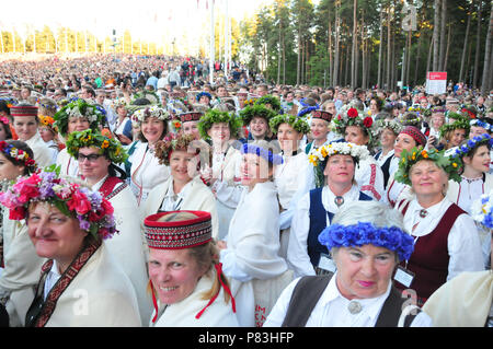 Riga, Latvia. 8th July, 2018. Singers in national costumes are seen before the closing concert of Latvia's XXVI Nationwide Song and XVI Dance Celebration in Riga, Latvia, on July 8, 2018. This concert concluded the week-long national song and dance celebration in which about 43,000 dancers and singers from Latvia and abroad participated. Credit: Janis/Xinhua/Alamy Live News Stock Photo