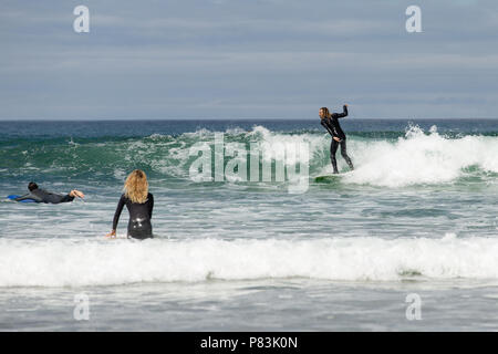 Strandhill, Sligo, Ireland. 8th July 2018: Surfers enjoying the great weather and Atlantic waves surfing in Strandhill in county Sligo - one of the best places in Europe to surf. Stock Photo