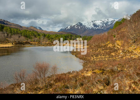 The Beinn Eighe range and Coulin Lodge over Loch Coulin, Torridon, Highland Region, Scotland, UK Stock Photo