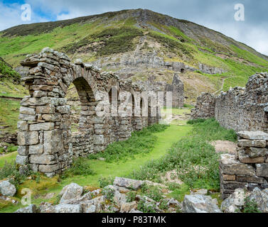 Ruins of Blakethwaite smelt mill peat store remains of the once thriving lead mining industry near Gunnerside in Swaledale in the Yorkshire Dales UK Stock Photo