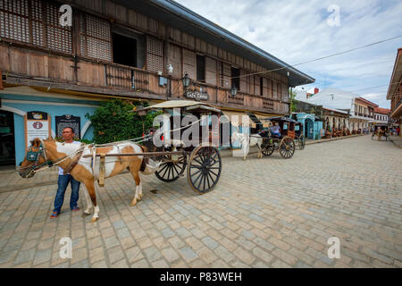 The picturesque 16th century Spanish colonial town of Vigan in the Philippines with its horse-drawn carriages and cobblestone streets Stock Photo