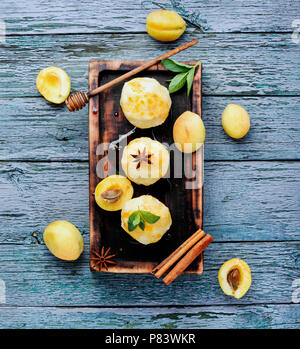 Fruit dumplings with apricot and spicy syrup Stock Photo