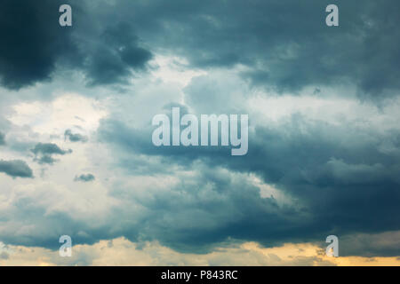 Dramatic stormy sky with heavy clouds, may be used as background Stock Photo